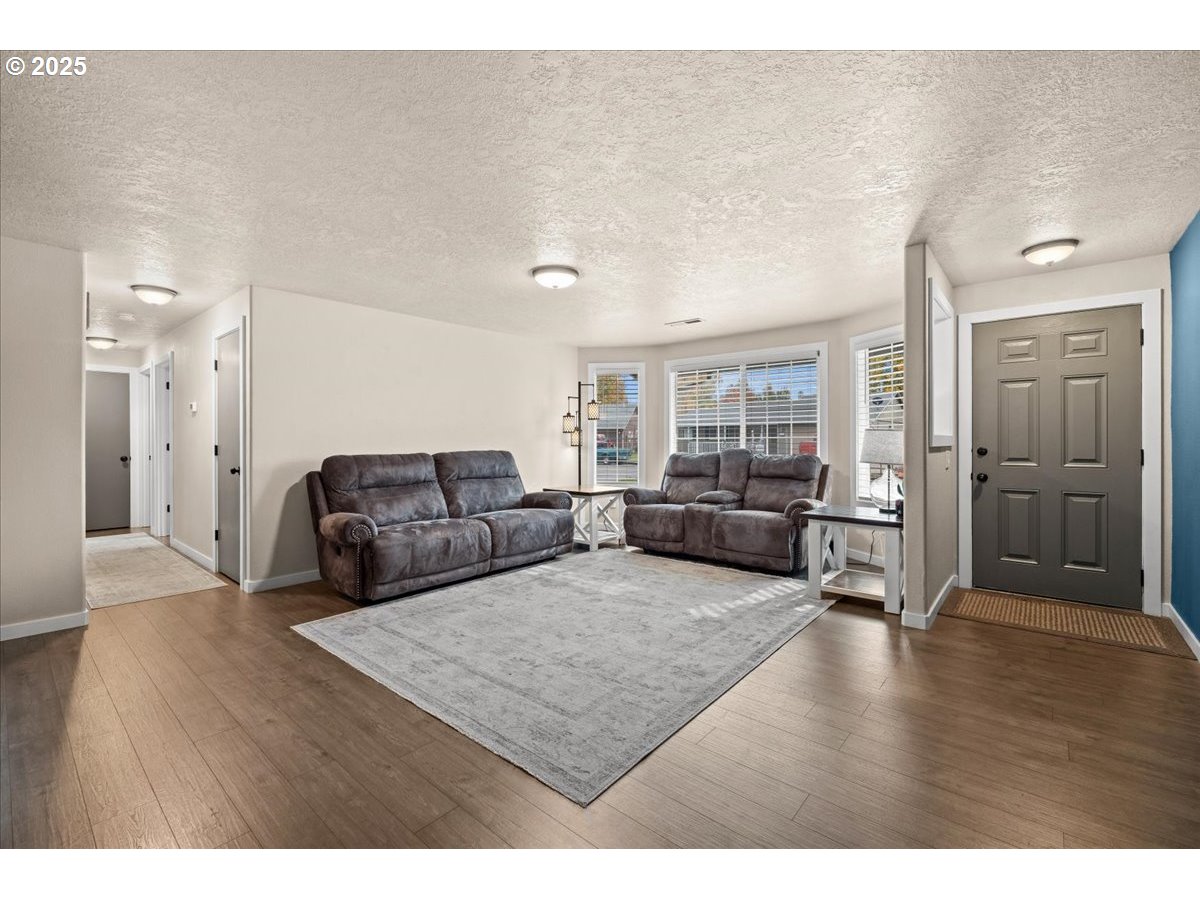 2788 South Beech Street Cornelius, OR 97113 - Photo 8 of 40 a living room with furniture and wooden floor