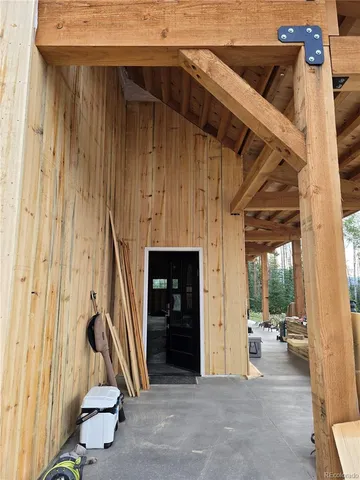 a view of a house with wooden floor and a sink