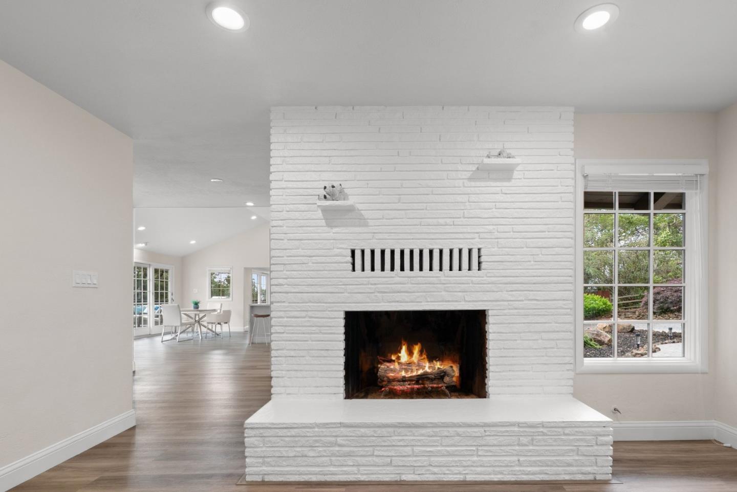 770 Graham Hill Road Santa Cruz, CA 95060 - Photo 16 of 83 a living room with furniture and a fireplace