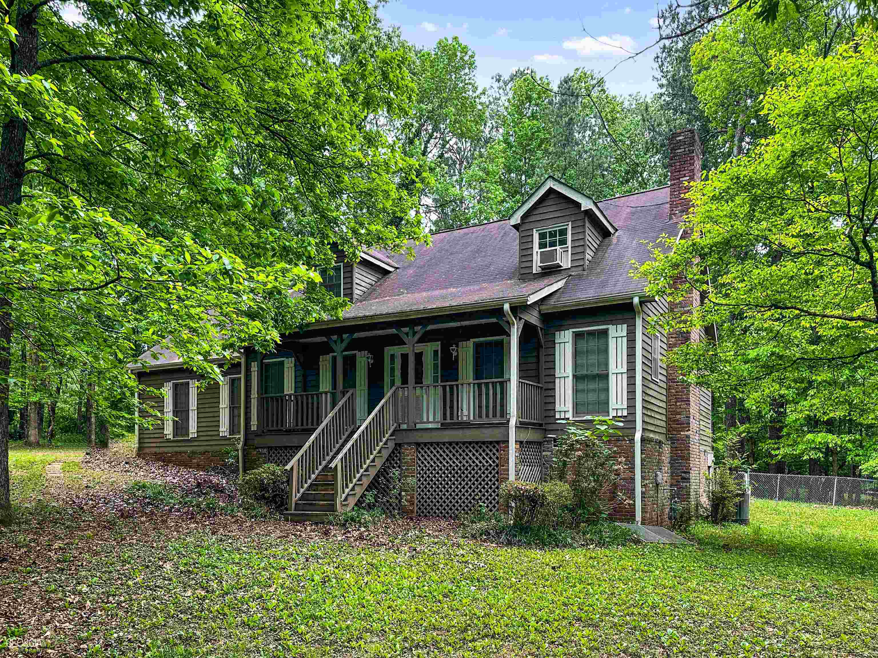303 Austin Road Stockbridge, GA 30281 - Photo 1 of 1 a front view of a house with garden