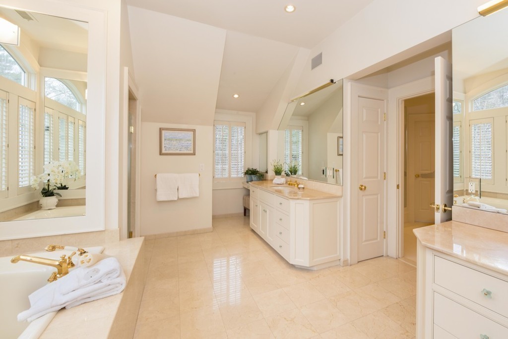 144 Sandy Pond Road Lincoln, MA 01773 - Photo 14 of 30 a bathroom with a sink a tub and a mirror