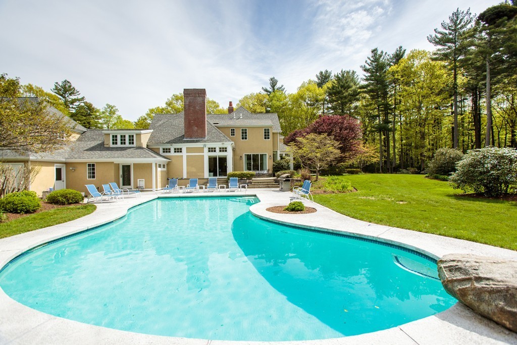 144 Sandy Pond Road Lincoln, MA 01773 - Photo 27 of 30 a view of a house with a big yard potted plants and large tree