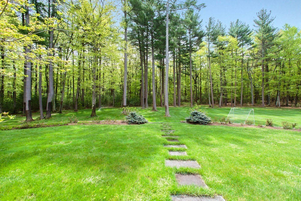 144 Sandy Pond Road Lincoln, MA 01773 - Photo 29 of 30 a view of a park with a house in the background