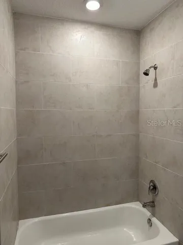 a bathroom with a bathtub