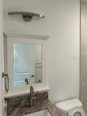 a bathroom with a sink and a toilet