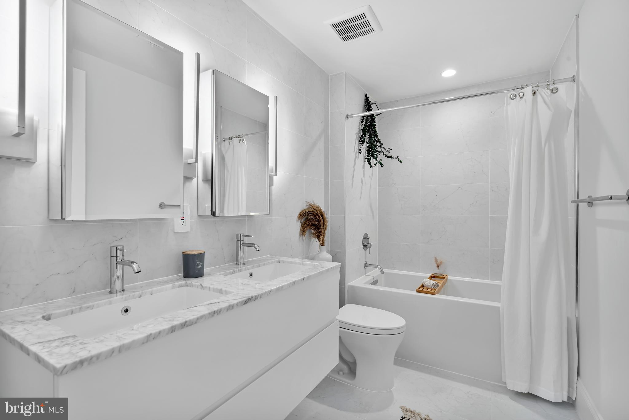 2630 39th Street Northwest, Unit 1 Washington, DC 20007 - Photo 15 of 22 Kohler Soaking Tub & Marble Tile