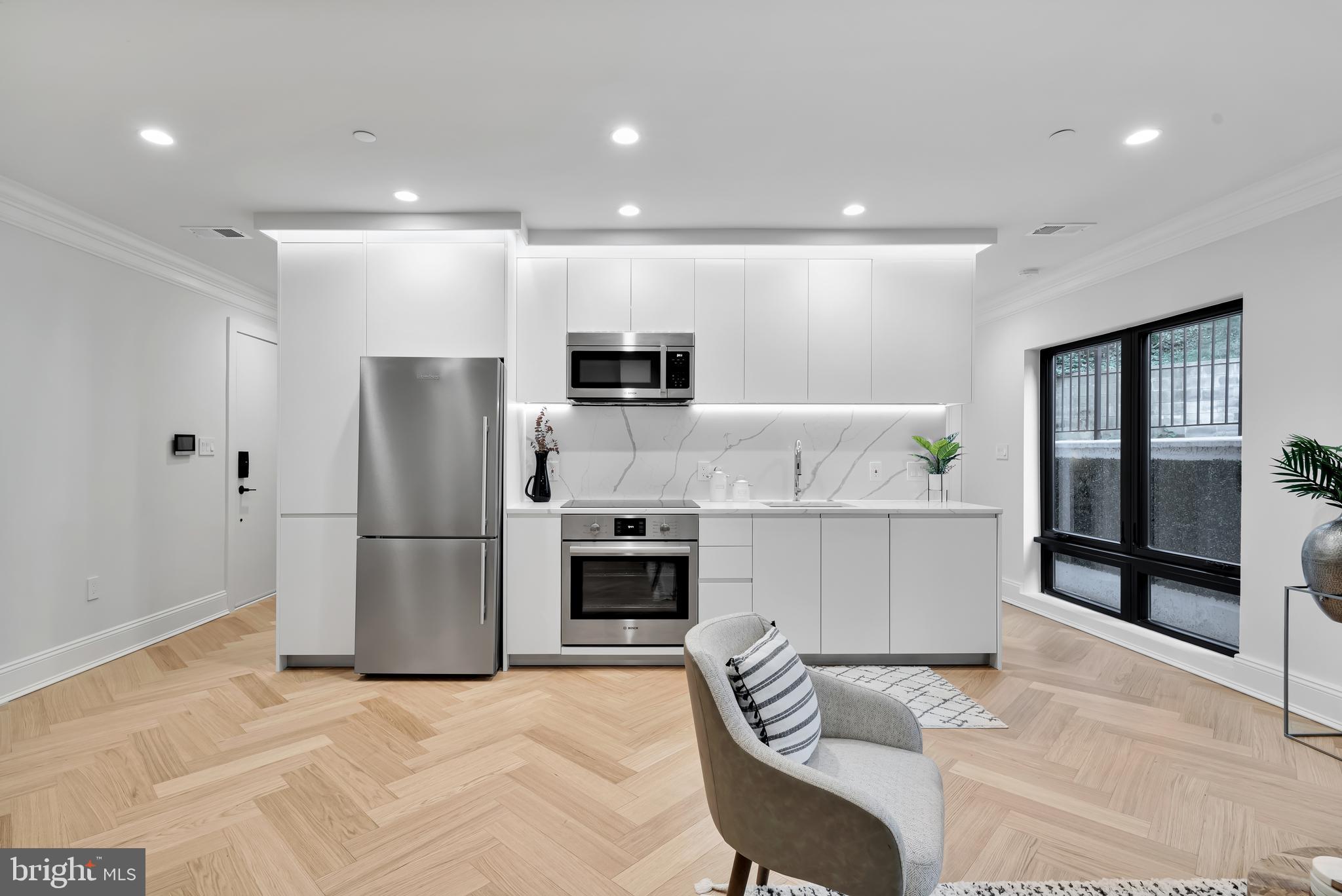 2630 39th Street Northwest, Unit 1 Washington, DC 20007 - Photo 8 of 22 Porcelanosa Countertops & Bosch Appliances