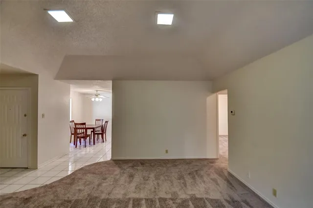 a view of a livingroom and a dining room