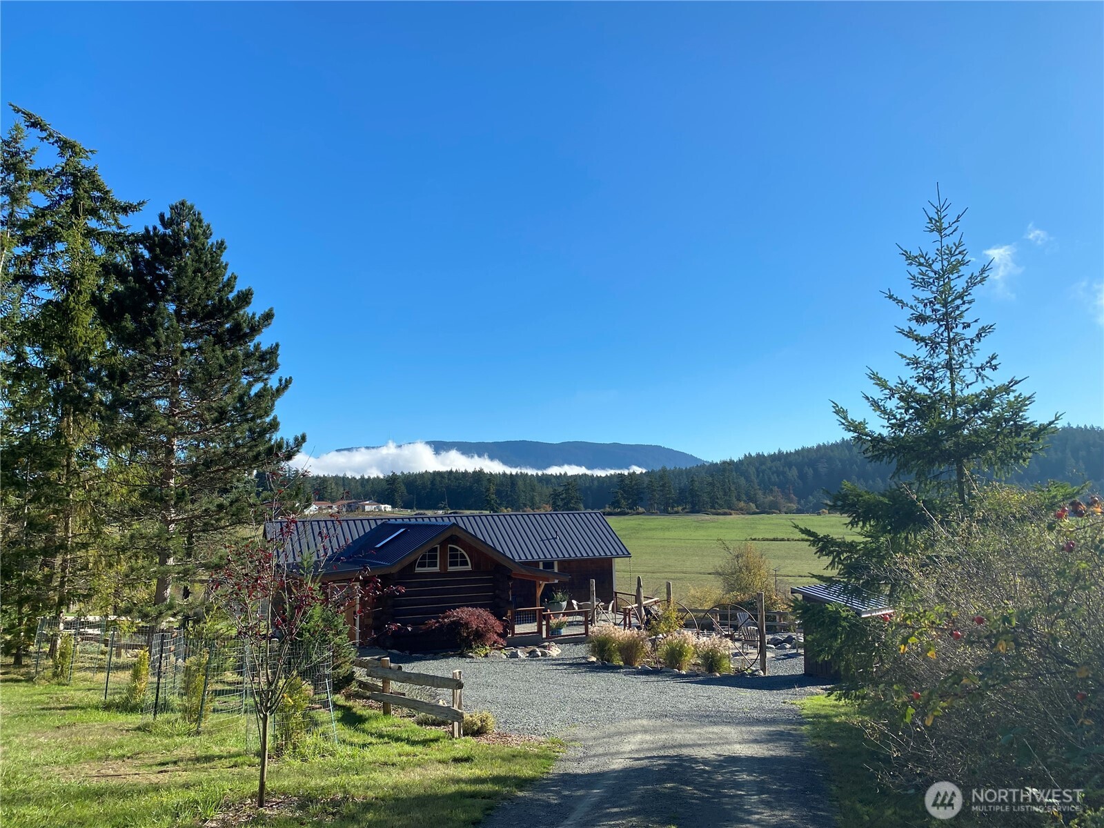 4263 Orcas Road Orcas Island, WA 98245 - Photo 2 of 39 a view of a lake with houses