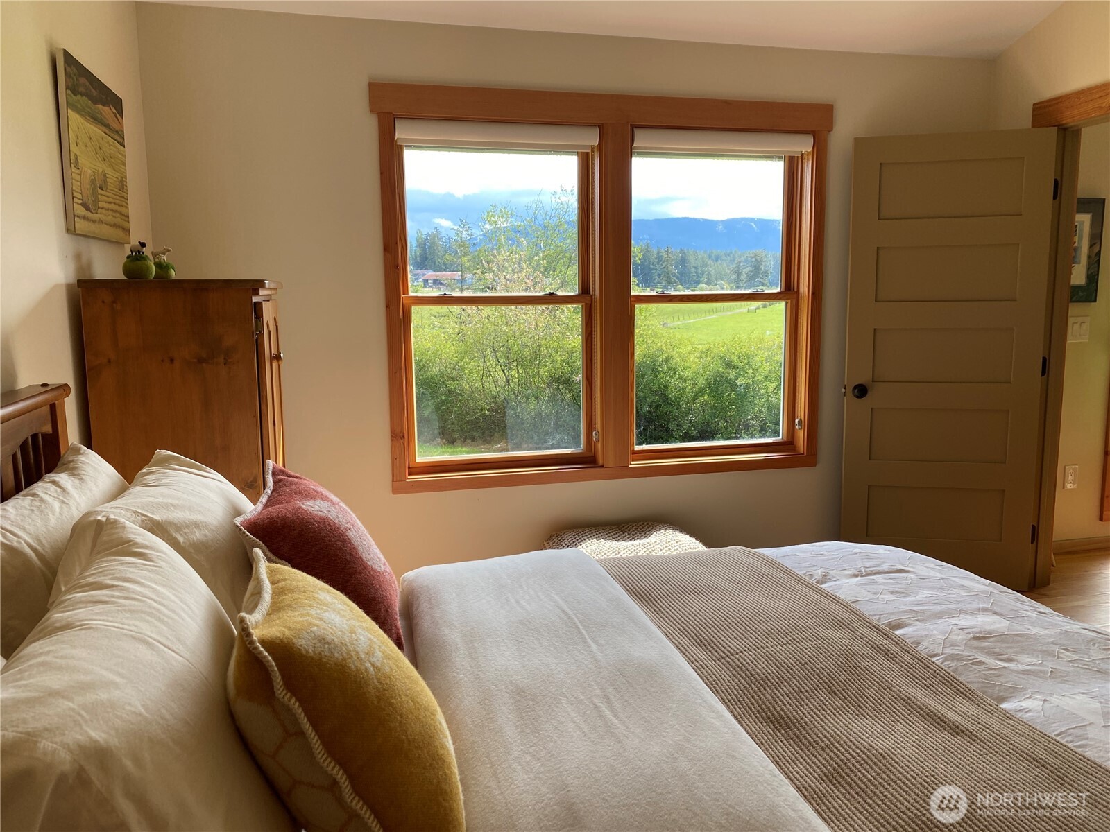 4263 Orcas Road Orcas Island, WA 98245 - Photo 32 of 39 a bedroom with a bed and a window