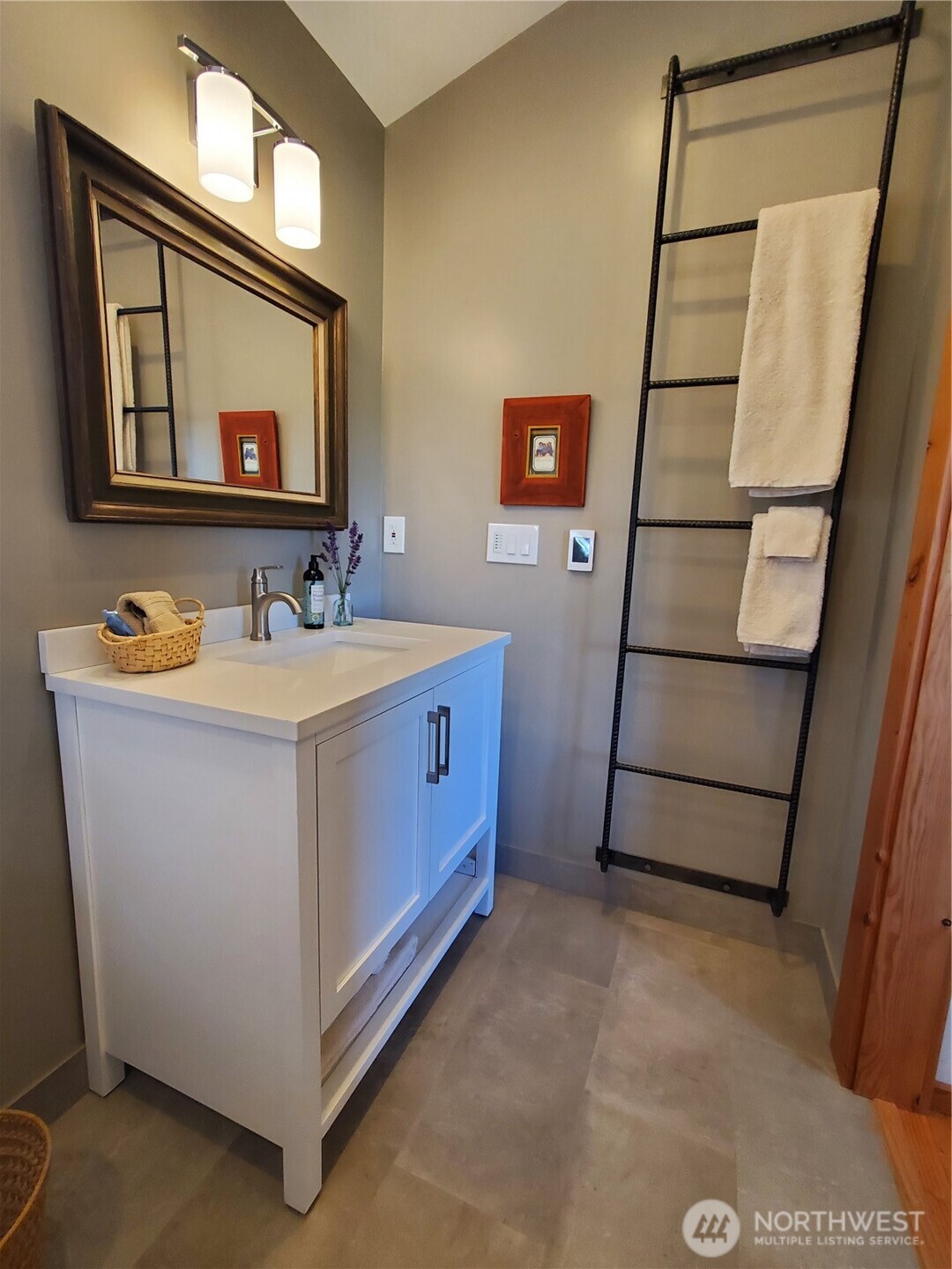 4263 Orcas Road Orcas Island, WA 98245 - Photo 37 of 39 a bathroom with a sink mirror and vanity