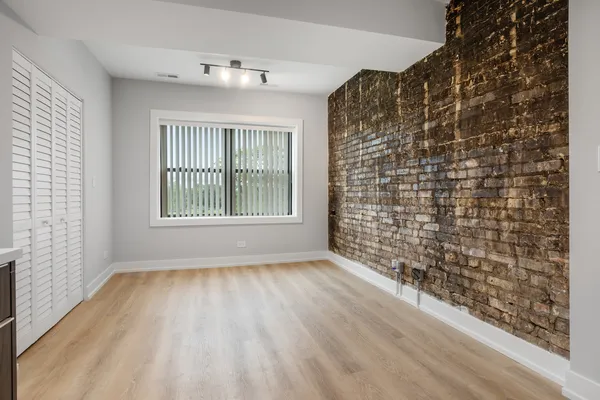 a view of an empty room and window