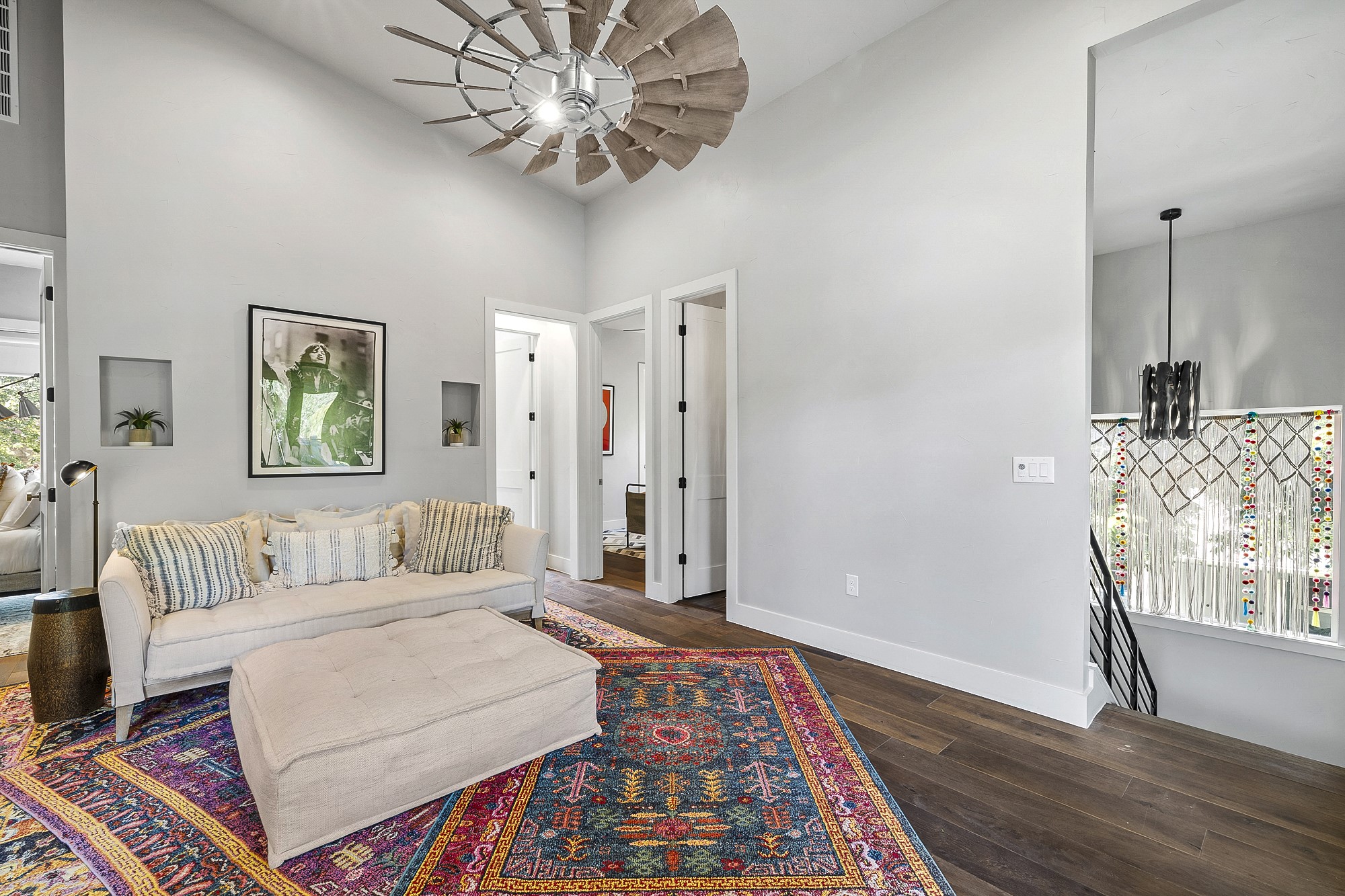 2414 Kinney Road Austin, TX 78704 - Photo 16 of 40 a bedroom with a bed and a chandelier