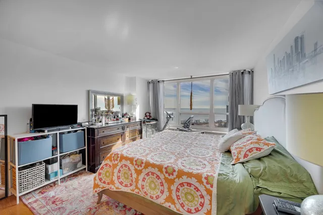 a bedroom with a bed and furniture