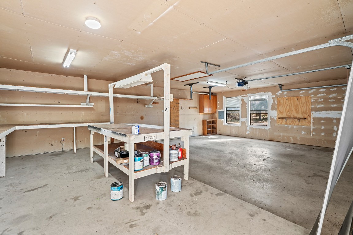 128 Mockingbird Lane Georgetown, TX 78633 - Photo 29 of 40 a storage room with air conditioner duct and materials on floor