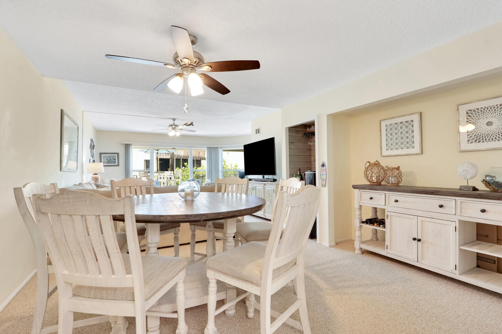 2051 Northeast Ocean Boulevard, Unit A12 Stuart, FL 34996 - Photo 2 of 39 a dining room with furniture and window
