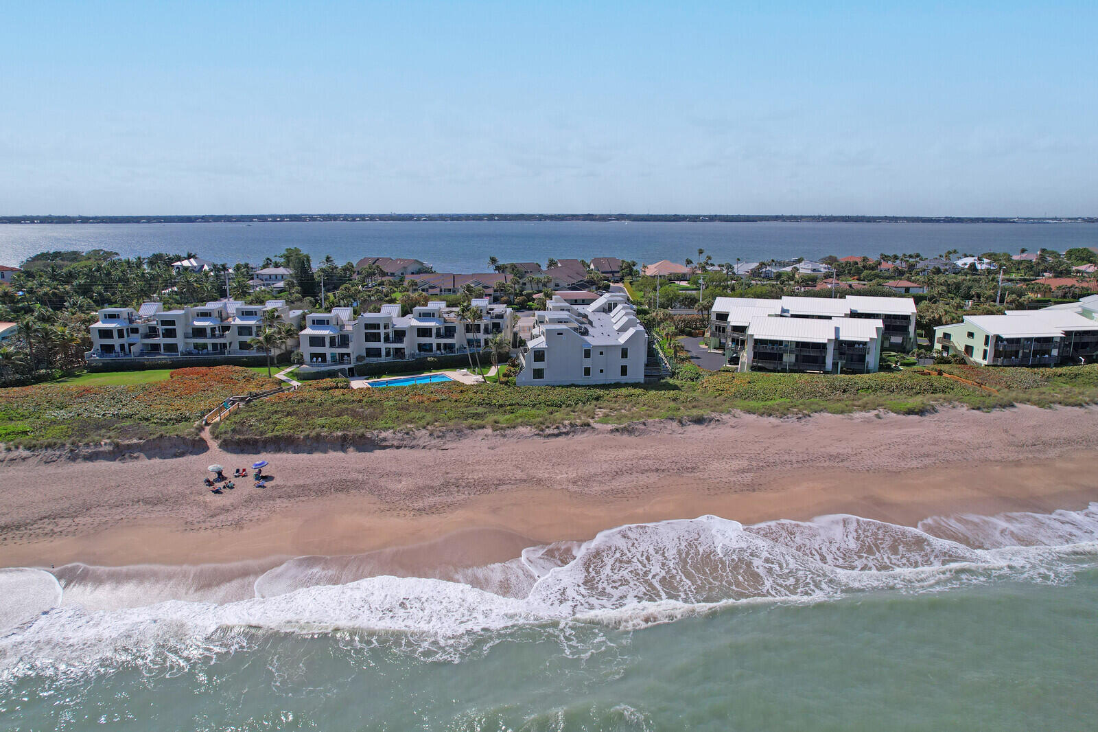 2051 Northeast Ocean Boulevard, Unit A12 Stuart, FL 34996 - Photo 36 of 39 an aerial view of a house with a yard