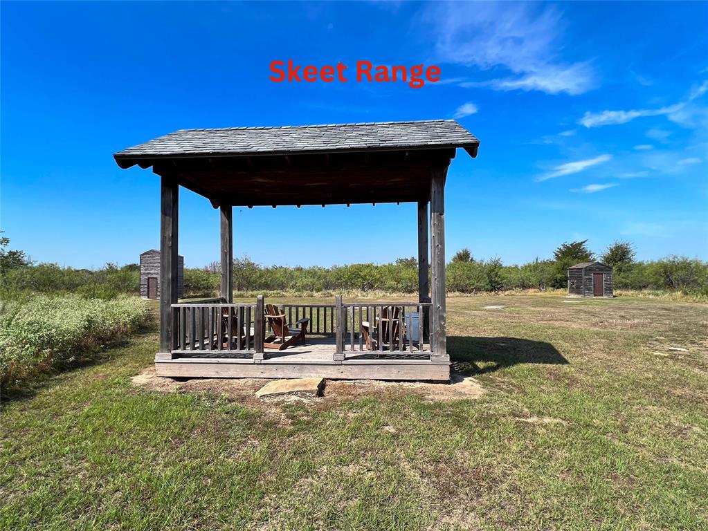 445 Sun Valley Mabank, TX 75147 - Photo 27 of 33 a view of swimming pool with a table and chairs under an umbrella