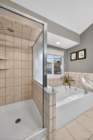 $360,000 | 1452 Cedar Bluff Drive, Ballwin, MO 63021