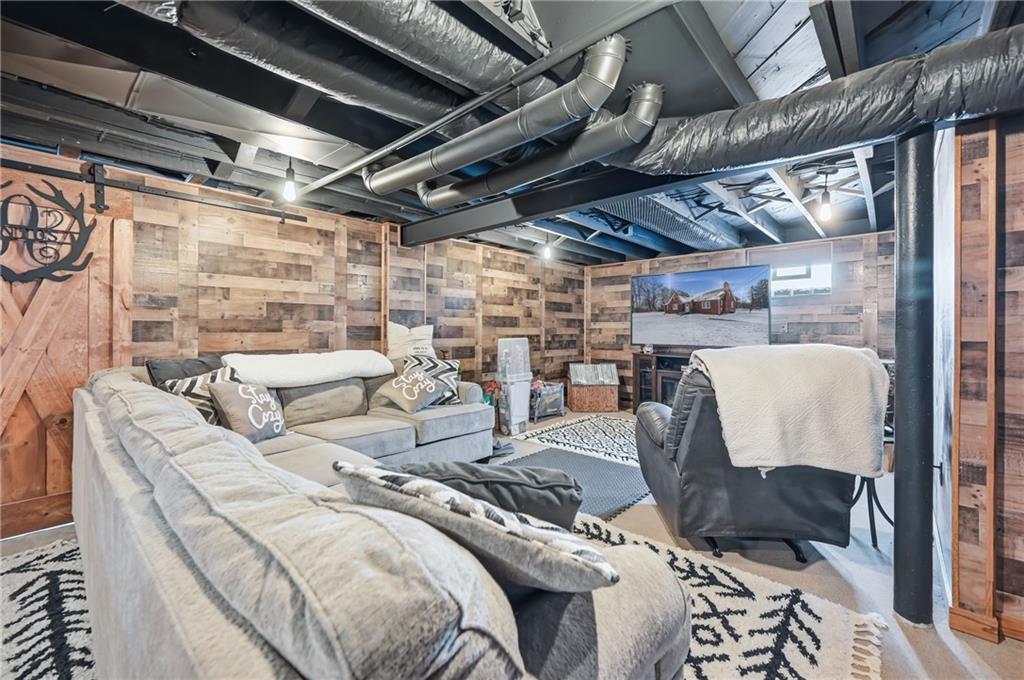 7376 Sharon-Mercer Road Mercer, PA 16137 - Photo 31 of 50 Finished lower level with family room