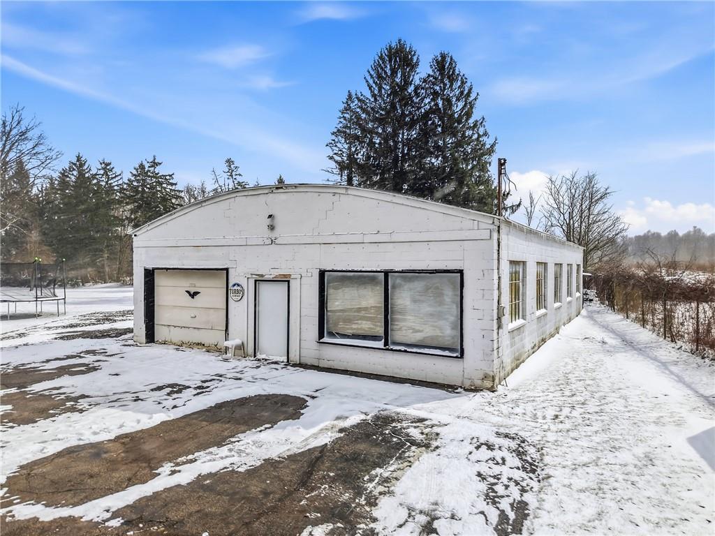 7376 Sharon-Mercer Road Mercer, PA 16137 - Photo 4 of 50 5+ car garage with 2 overhead, 2 man doors & office. Previously held auto license (expired)