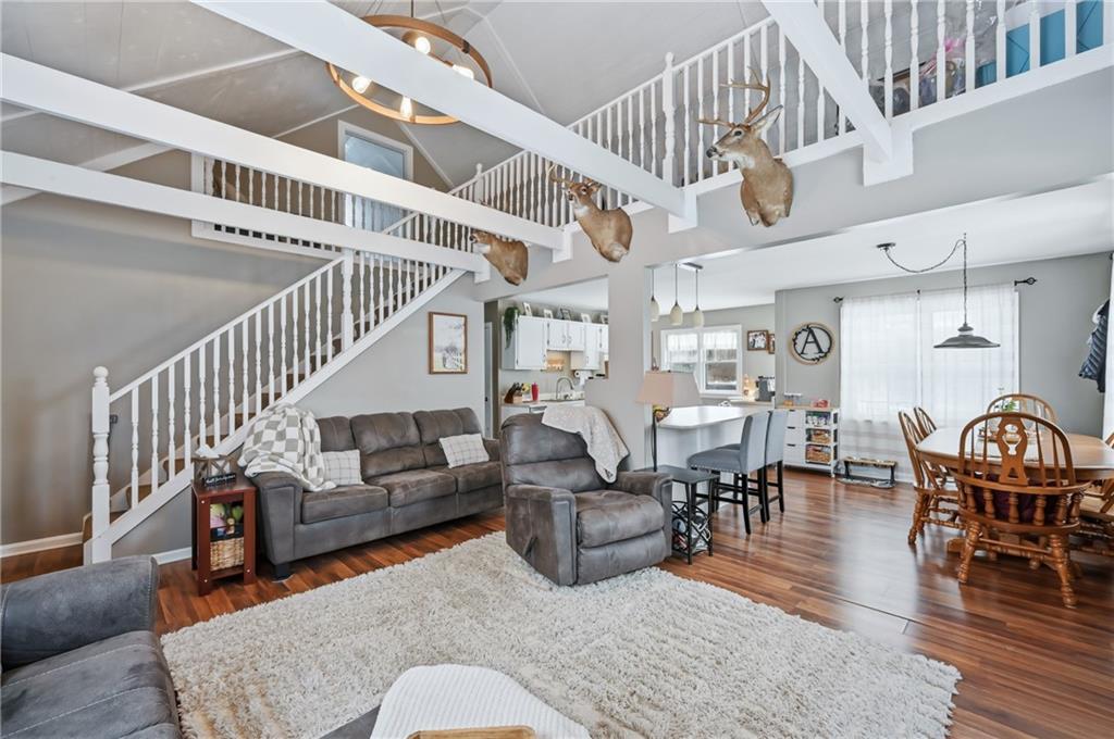 7376 Sharon-Mercer Road Mercer, PA 16137 - Photo 9 of 50 Open living room & dining area, lofted cat walk area overlooking living room
