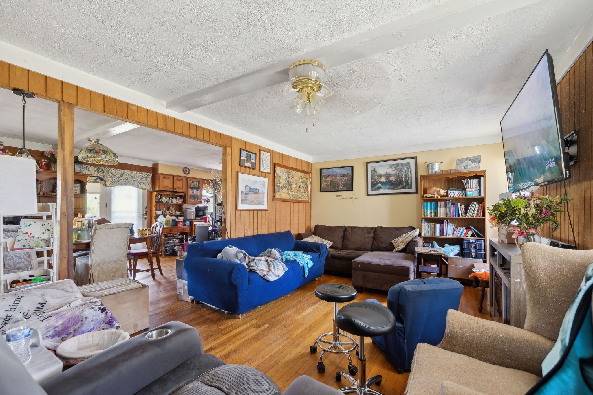 3467 Shouse Road Santa Fe, TN 38482 - Photo 16 of 46 a living room with furniture fireplace and a flat screen tv