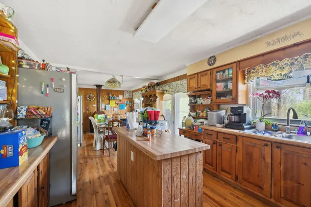 a view of a play room with furniture and toys