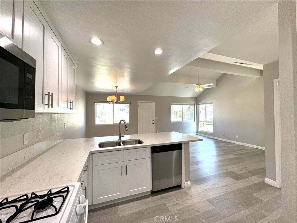 700 West Walnut Avenue, Unit 8 Orange, CA 92868 - Photo 7 of 11 a kitchen with a sink cabinets and window