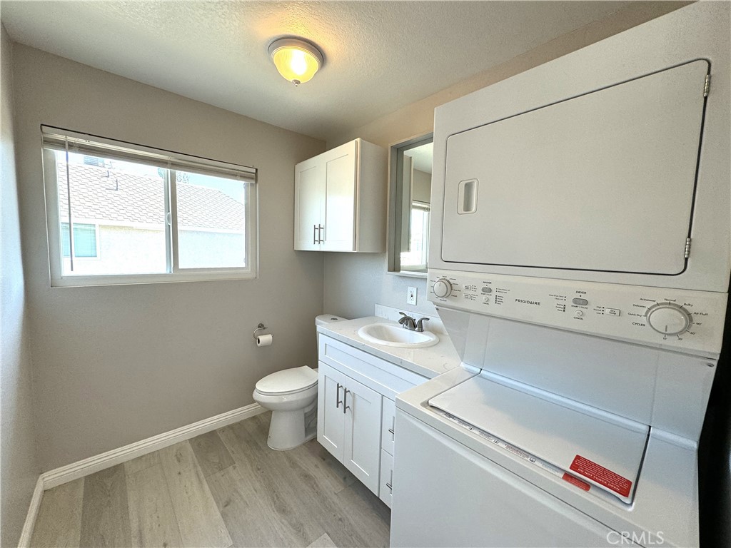 700 West Walnut Avenue, Unit 8 Orange, CA 92868 - Photo 8 of 11 a view of bathroom with a sink and a toilet