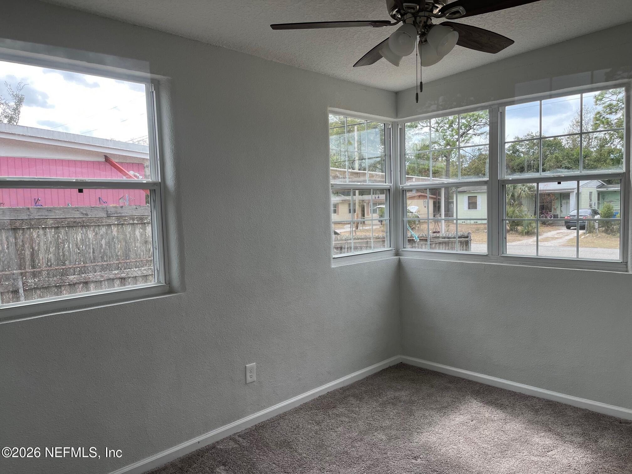10547 Briarcliff Road East Jacksonville, FL 32218 - Photo 15 of 33 an empty room with a window