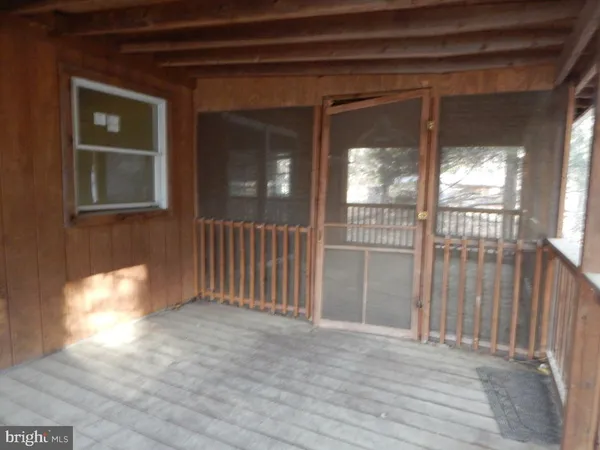 a view of an entryway with a window