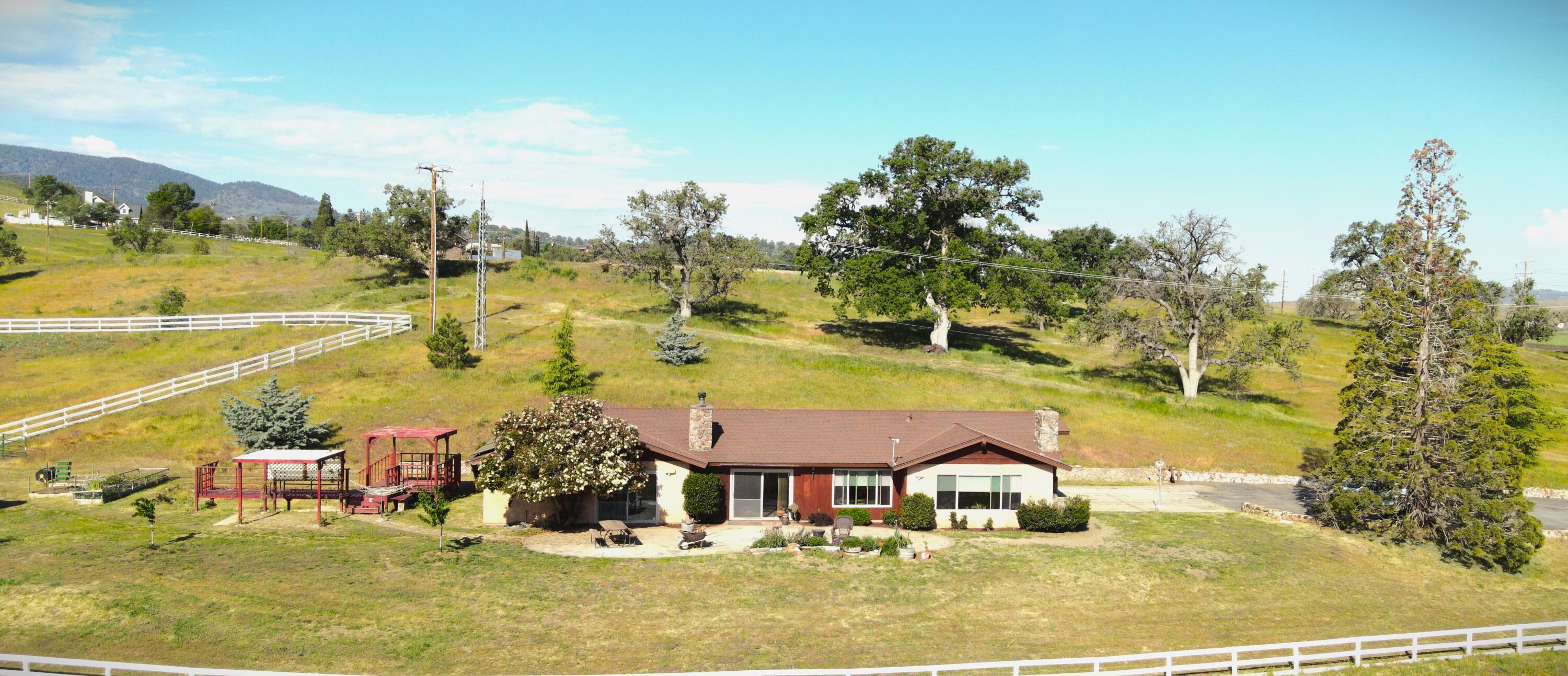 a view of a swimming pool with an outdoor space and seating area