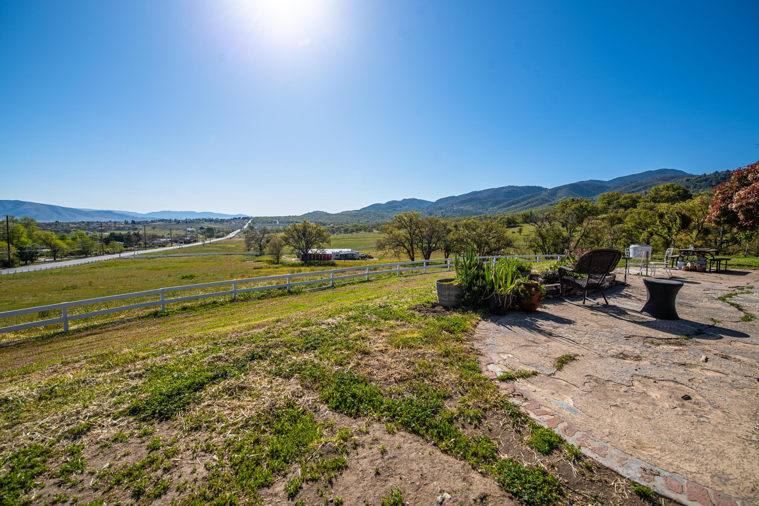 21970 Highline Road Tehachapi, CA 93561 - Photo 14 of 68 a view of a lake with a mountain in the background