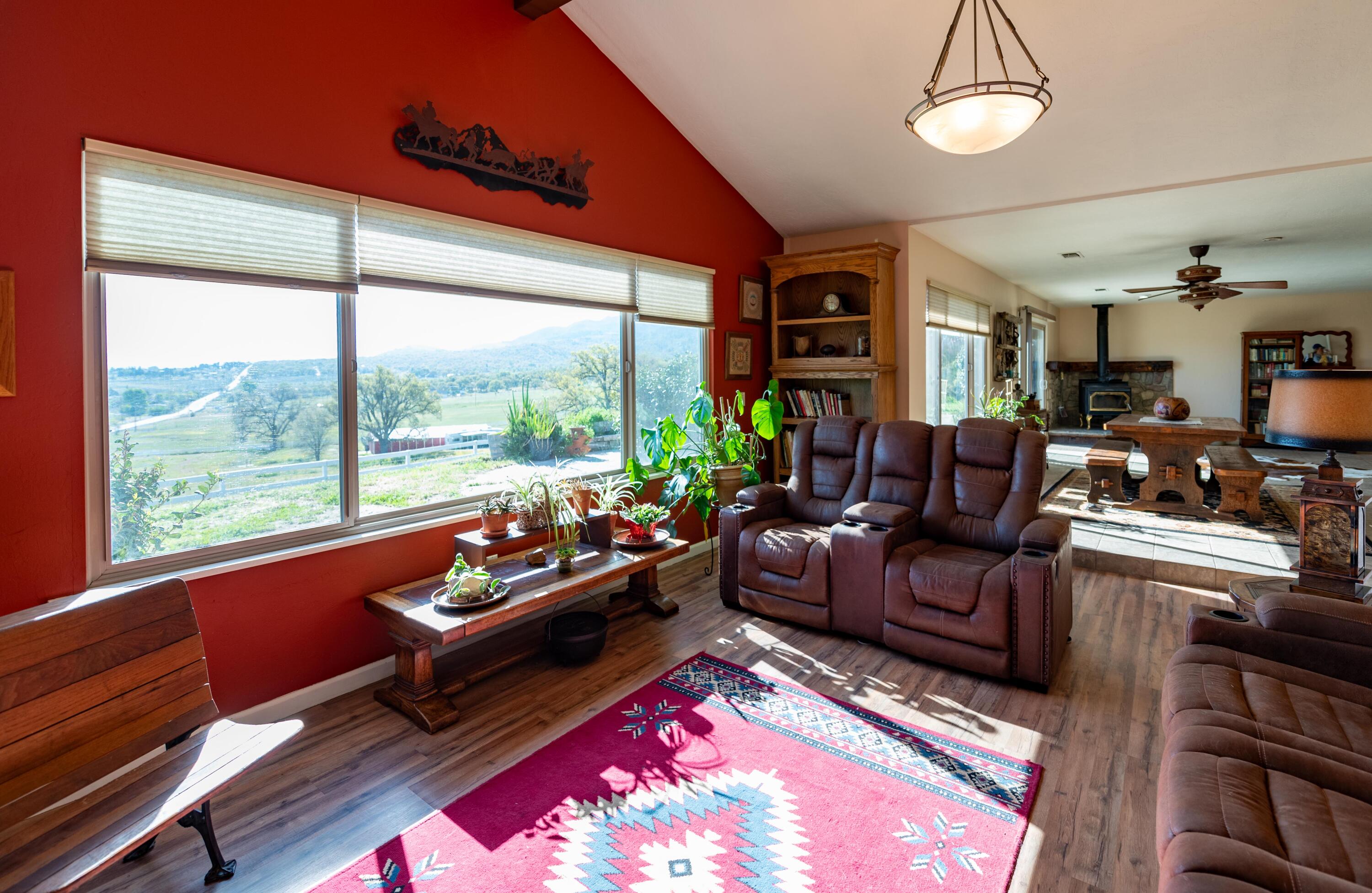 21970 Highline Road Tehachapi, CA 93561 - Photo 27 of 68 a living room with furniture and a large window