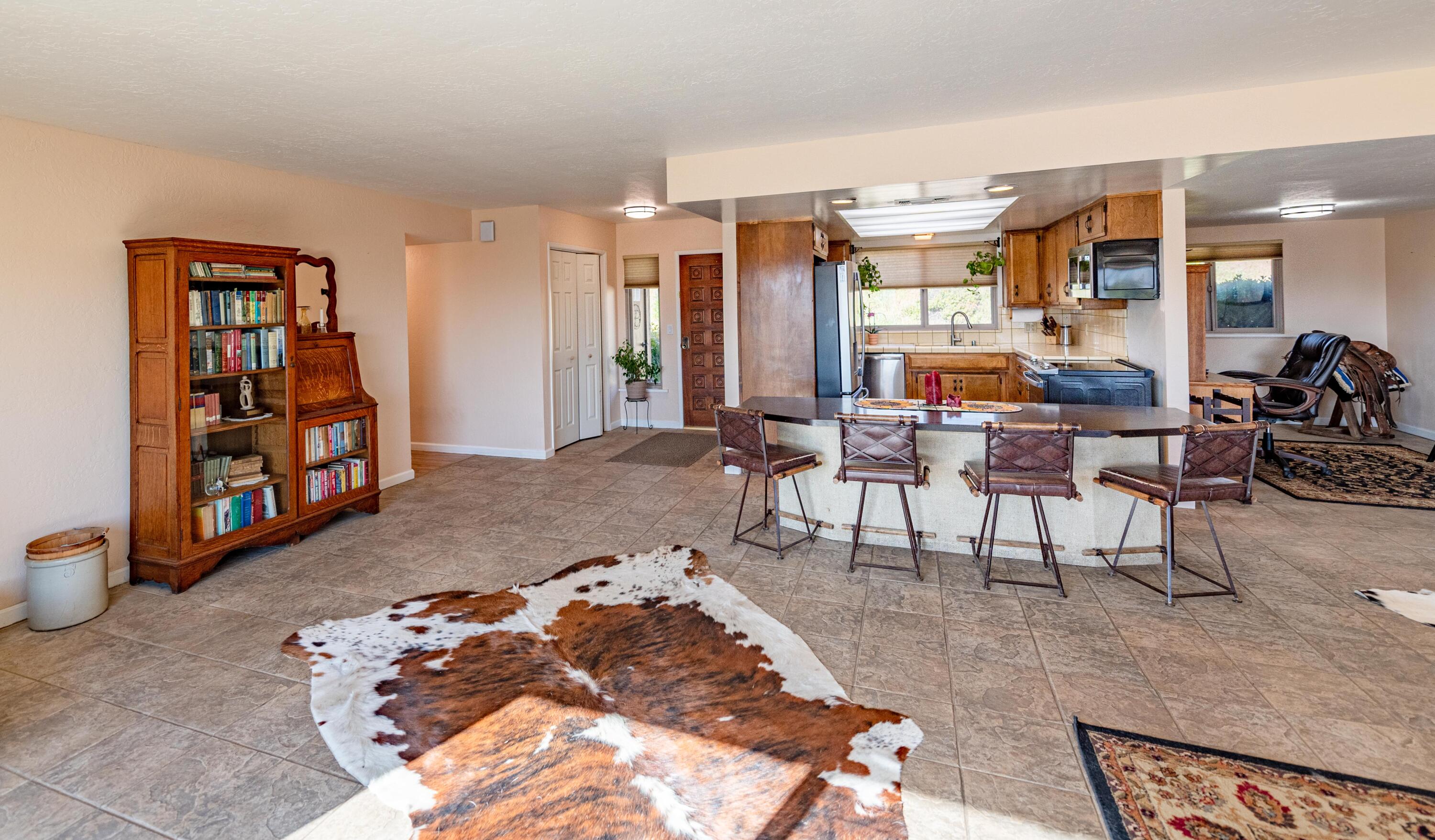 21970 Highline Road Tehachapi, CA 93561 - Photo 33 of 68 a living room with furniture and a large window