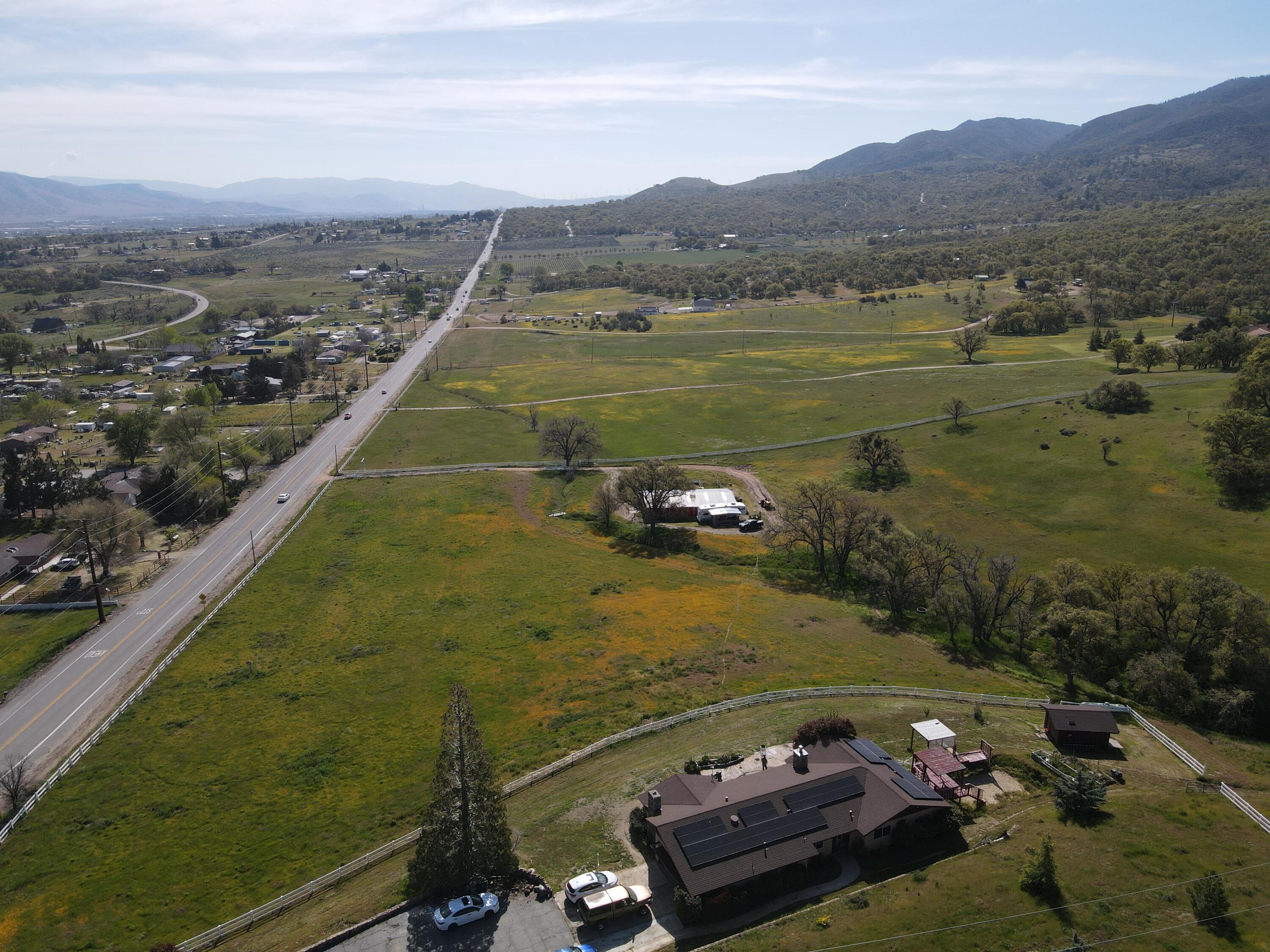 21970 Highline Road Tehachapi, CA 93561 - Photo 67 of 68 a view of a lake with a mountain