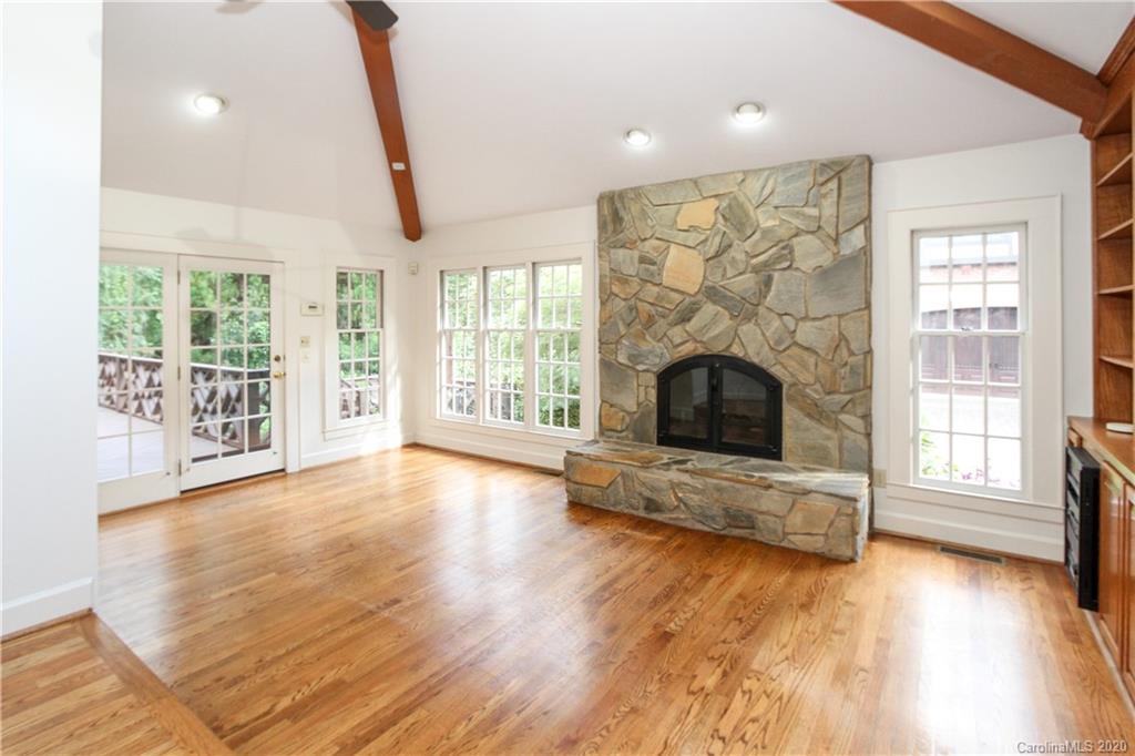 2120 Malvern Road Charlotte, NC 28207 - Photo 14 of 46 a living room with furniture and a fireplace