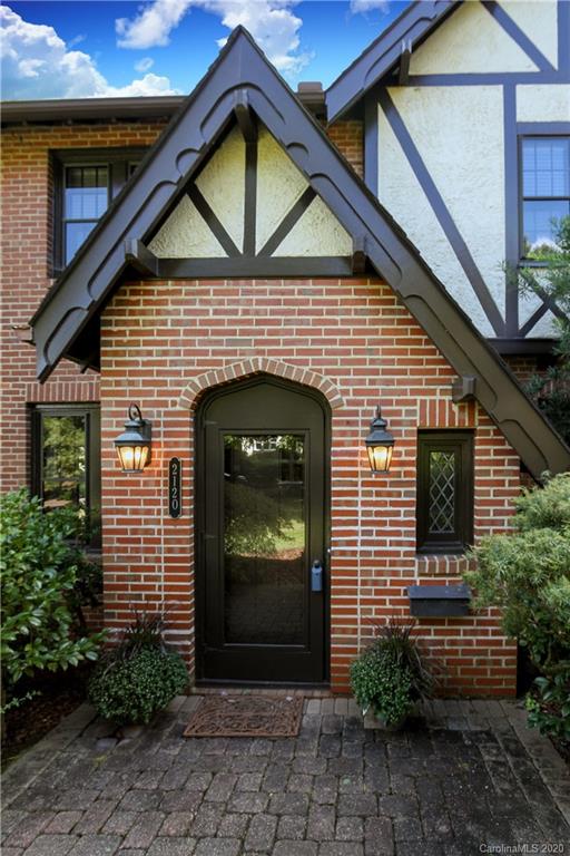 2120 Malvern Road Charlotte, NC 28207 - Photo 3 of 46 a front view of a house with garden