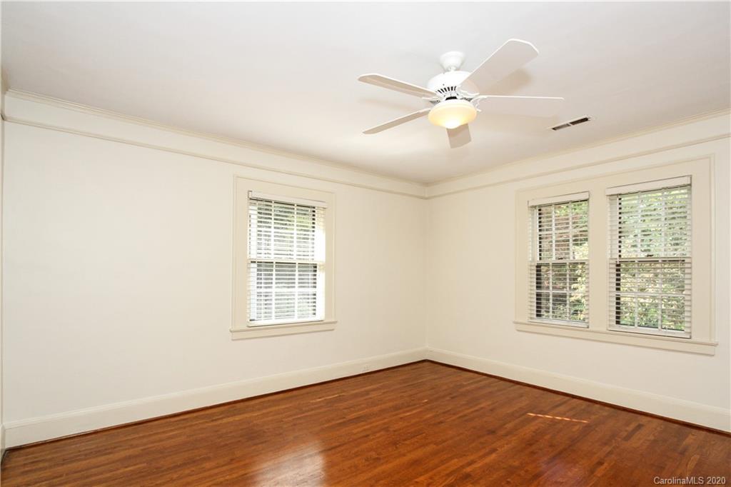 2120 Malvern Road Charlotte, NC 28207 - Photo 22 of 46 wooden floor in an empty room with a window