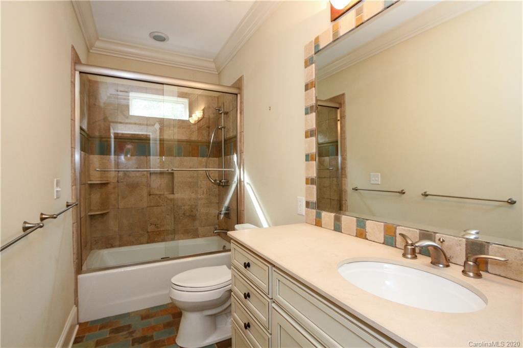 2120 Malvern Road Charlotte, NC 28207 - Photo 29 of 46 a bathroom with a sink toilet and shower