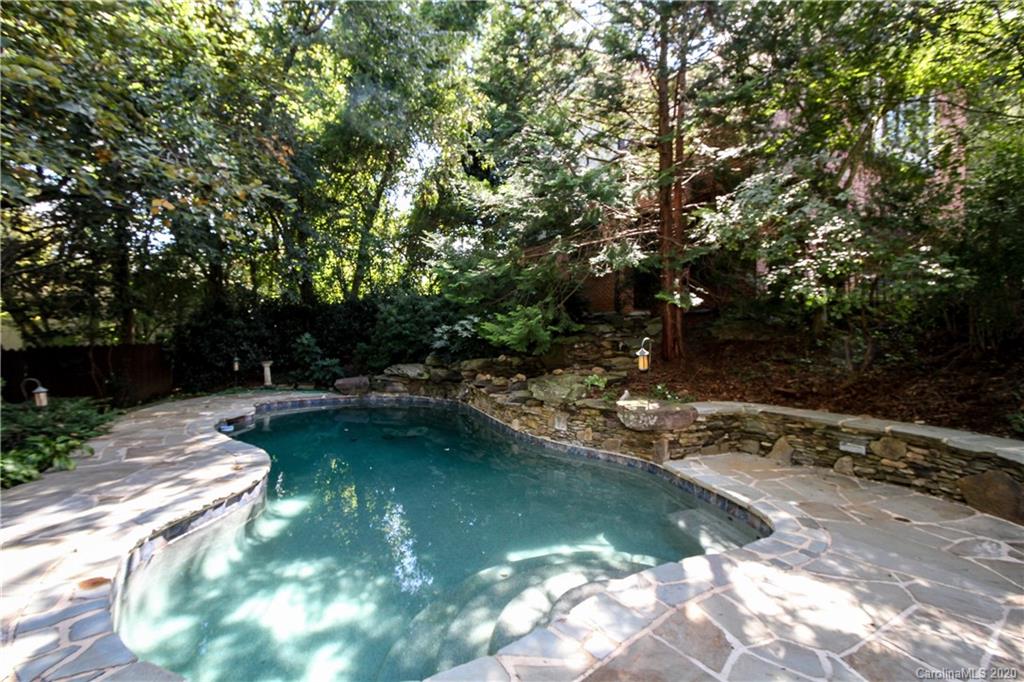 2120 Malvern Road Charlotte, NC 28207 - Photo 40 of 46 a view of swimming pool with a yard