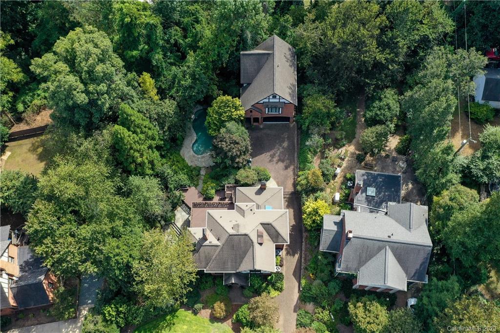 2120 Malvern Road Charlotte, NC 28207 - Photo 43 of 46 an aerial view of a house with outdoor space and trees all around