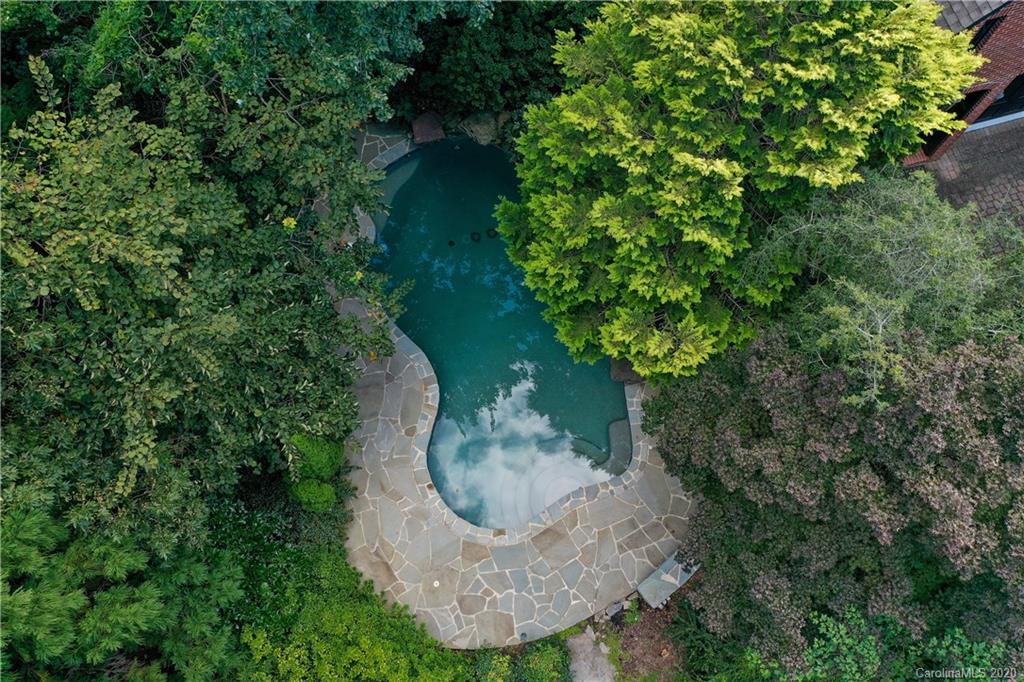 2120 Malvern Road Charlotte, NC 28207 - Photo 45 of 46 an aerial view of a house with a yard and trees all around