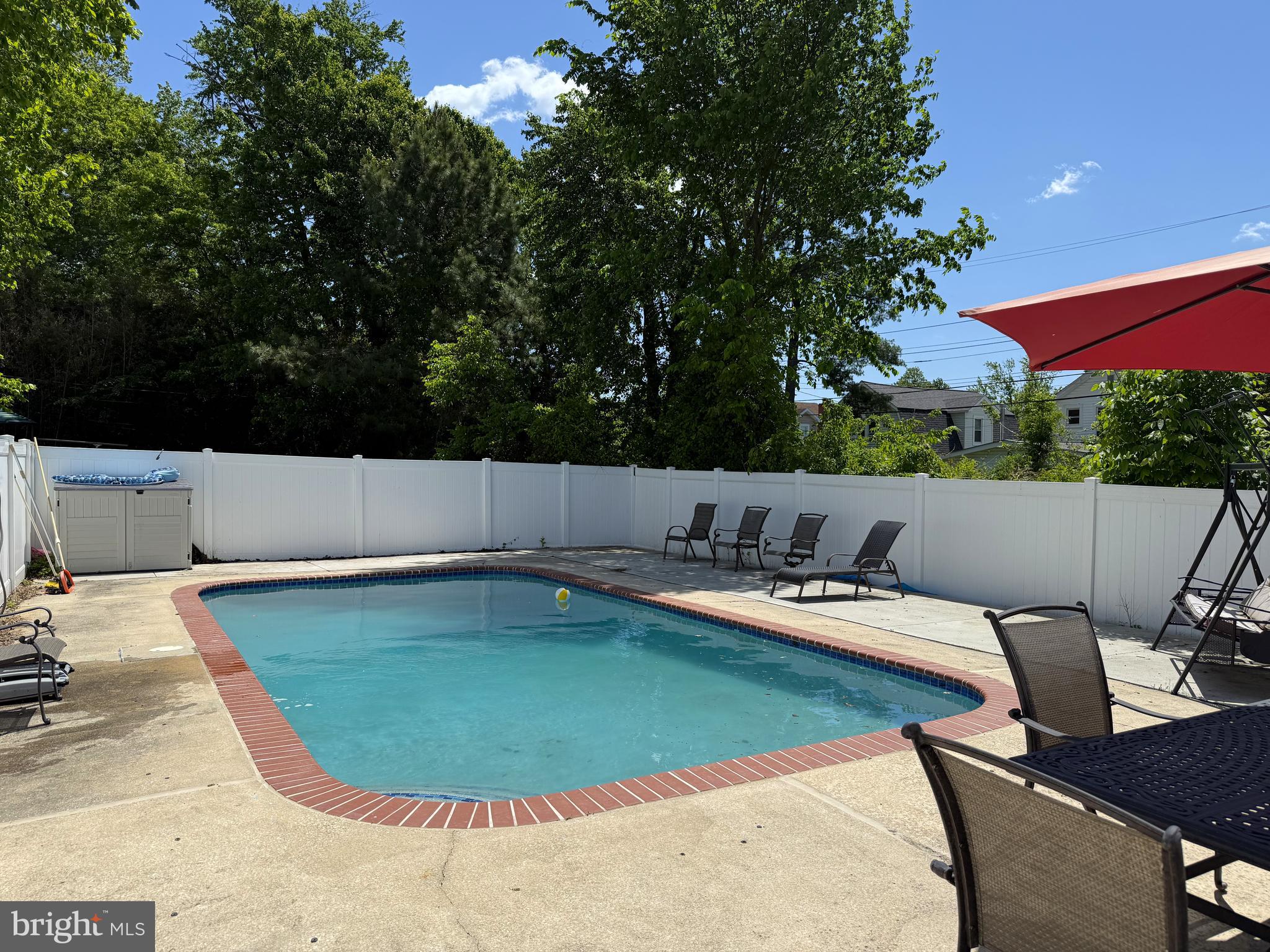 3215 Northbrook Road Baltimore, MD 21208 - Photo 48 of 50 a view of a swimming pool with a patio