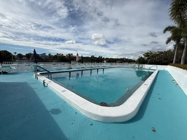 a view of a lake with a yard