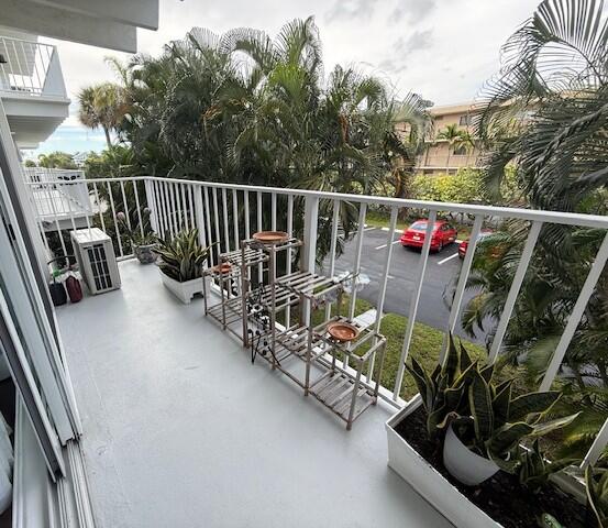 4001 South Ocean Boulevard, Unit 218 South Palm Beach, FL 33480 - Photo 3 of 13 a view of a balcony with chairs