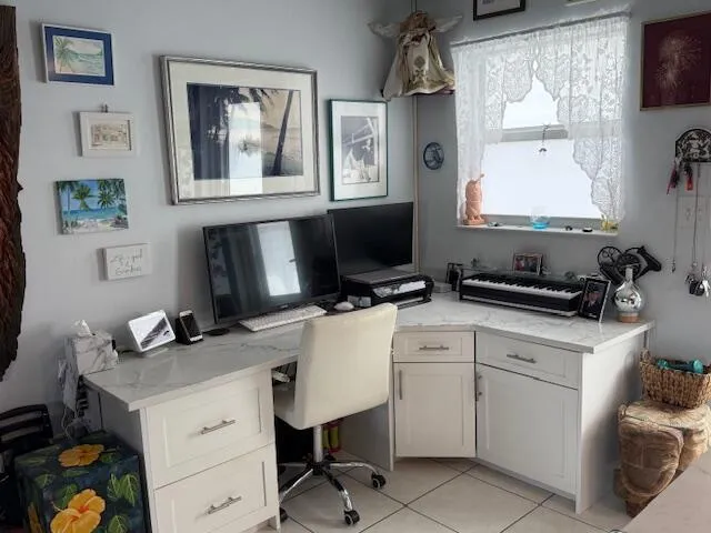 a kitchen with a sink cabinets and window