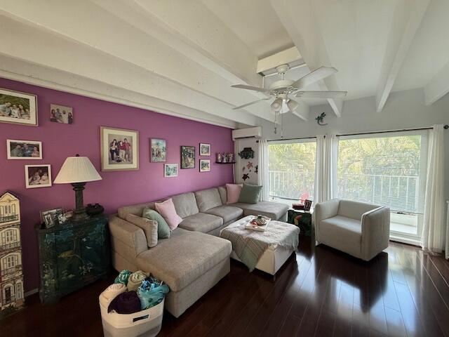 4001 South Ocean Boulevard, Unit 218 South Palm Beach, FL 33480 - Photo 7 of 13 a living room with furniture and a large window