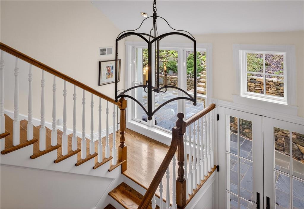 321 Fairview Road Pittsburgh, PA 15238 - Photo 28 of 50 a view of staircase with lots of frames on wall and a window